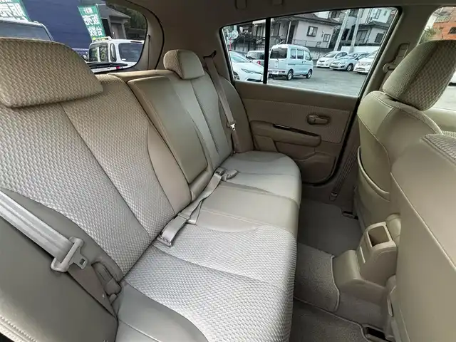 日産 ティーダ 15M SV +プラズマ 熊本県 2012(平24)年 7.4万km シルキーベージュ 純正7インチナビ(MP311D-A)/【ワンセグTV/Bluetooth/DVD/CD】/オートライト/ETC/純正フロアマット/取扱説明書