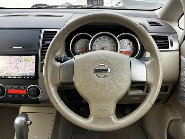 日産 ティーダ 15M SV +プラズマ 熊本県 2012(平24)年 7.4万km シルキーベージュ 純正7インチナビ(MP311D-A)/【ワンセグTV/Bluetooth/DVD/CD】/オートライト/ETC/純正フロアマット/取扱説明書