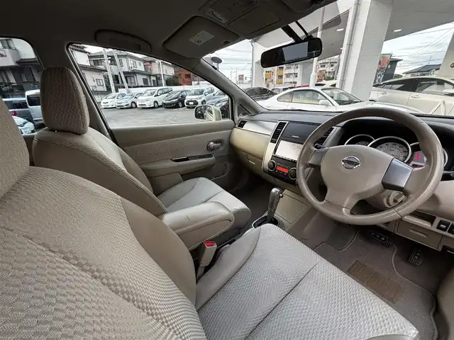 日産 ティーダ 15M SV +プラズマ 熊本県 2012(平24)年 7.4万km シルキーベージュ 純正7インチナビ(MP311D-A)/【ワンセグTV/Bluetooth/DVD/CD】/オートライト/ETC/純正フロアマット/取扱説明書