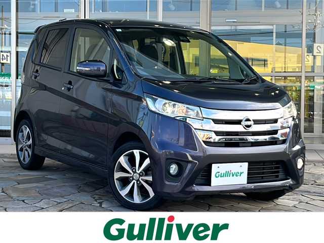 日産 デイズ ハイウェイスターG 静岡県 2015(平27)年 7.2万km プレミアムパープルP 純正ナビ/・（Bluetooth/CD/DVD/TV/AUX/ラジオ）/主要装備/・エマージェンシーブレーキー/・レーンキープアシスト/・横滑り防止装置/・アイドリングストップ/・全方位カメラ/・アラウンドビューモニター/・ステアリングリモコン/・ハーフレザーシート/・ベンチシート/・キセノンヘッドライト/・純正アルミホイール/・純正フロアマット/・ドライブレコーダー/・ETC/・インテリキー