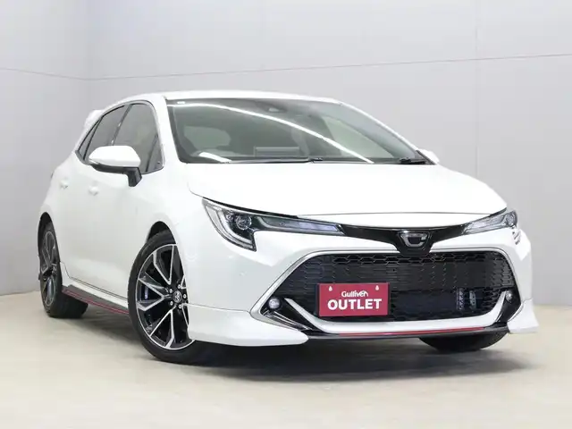 トヨタ カローラ スポーツ G Z 三重県 2020(令2)年 5.1万km ホワイトパールクリスタルシャイン TRDエアロ/社外リアスポイラー/柿本レーシング GT box 06＆S マフラー/セーフティセンス/純正ディスプレイオーディオ/・地デジTV/・Bluetooth/バックカメラ/コムテック前後ドライブレコーダー/全車速追従機能付レーダークルーズコントロール/レーントレーシングアラート/ブラインドスポットモニター/クリアランスソナー/バックソナー/リアクロストラフィックアラート/革コンビシートセット/・レッド革/ブラックウルトラスエードコンビシート/・前席シートヒーター/・シートバックポケット/ビルトインETC/丸型1灯式LEDヘッドランプ/・オートライト/オートマチックハイビーム/LEDフォグランプ/プッシュエンジンスタート/スマートキー×2/新車時保証書/取扱説明書