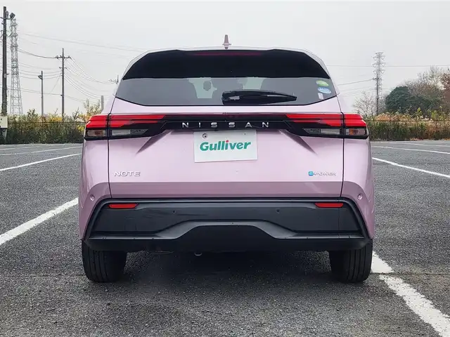 日産 ノート X 茨城県 2021(令3)年 8万km ピンク メーカーオプション9型ナビ/フルセグTV/アラウンドビューモニター/ビルトインETC2.0/ドライブレコーダー/デジタルルームミラー/レーダークルーズコントロール/フロント/バックソナー/プロパイロット/後側方車両検知機能/SOSコール/全方位運転支援システム/・エマージェンシーブレーキ/・前後踏み間違い衝突防止アシスト/・標識検知機能/・車線逸脱防止支援システム/メーカーオプションLEDヘッドランプ/ステアリングスイッチ/スマートキー/プッシュエンジンスターター/禁煙車