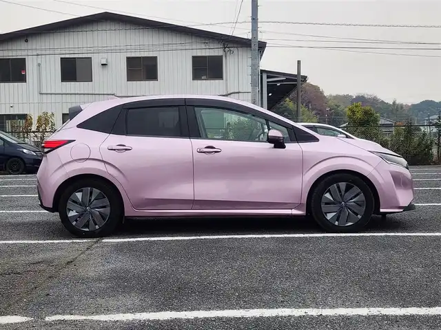 日産 ノート X 茨城県 2021(令3)年 8万km ピンク メーカーオプション9型ナビ/フルセグTV/アラウンドビューモニター/ビルトインETC2.0/ドライブレコーダー/デジタルルームミラー/レーダークルーズコントロール/フロント/バックソナー/プロパイロット/後側方車両検知機能/SOSコール/全方位運転支援システム/・エマージェンシーブレーキ/・前後踏み間違い衝突防止アシスト/・標識検知機能/・車線逸脱防止支援システム/メーカーオプションLEDヘッドランプ/ステアリングスイッチ/スマートキー/プッシュエンジンスターター/禁煙車