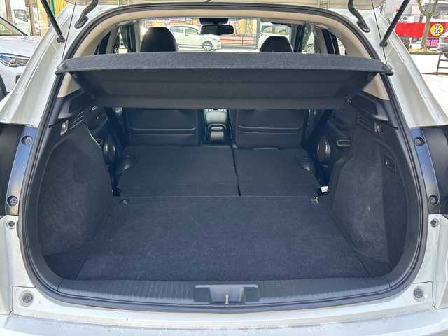 ホンダ ヴェゼル ハイブリッド 福岡県 2016(平28)年 9.2万km ホワイトオーキッドパール 純正ナビ・AM/FM・CD/DVD/フルTV・USB・HDMI・AUX/純正フロアマット/ETC（ビルド）/パドルシフト/クルーズコントロール/シートヒーター（D.N)/ブレーキホールド/横滑り防止/オートライト/車両接近通報装置/ウィンドシールドデアイサー/電動格納ミラー