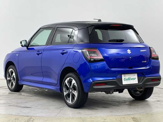 スズキ スイフト HYBRID MZ 道央・札幌 2023(令5)年 0.4万km キャラバンアイボリーパールM / シルバー2トーン ・４ＷＤ　/スズキセーフティサポート/・デュアルセンサーブレーキサポート２　/・ブラインドスポットモニター/・ドライバーモニタリングシステム/・アダプティブクルーズコントロール/・純正9インチメモリーナビゲーション/・CD/DVD/BT/フルセグTV/・スズキコネクト　/・バックカメラ/全方位カメラ　/・オートクルーズコントロール　/・シートヒーター＆リヤヒーターダクト/・マニュアルモード付パドルシフト/・アダプティブハイビームシステム/・オートライト/ＬＥＤライト/プレミアムUV＆IRカットガラス