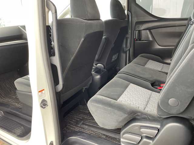 トヨタ ヴェルファイア Z 兵庫県 2015(平27)年 6.9万km ホワイトパールクリスタルシャイン ・純正9インチナビ（CD/DVD/SD/TV/BT)/・純正フリップダウンモニター/・バックカメラ/・ビルトインETC/・純正前方ドライブレコーダー/・両側パワースライドドア/・オートライト/・LEDライト/・社外20インチアルミホイール/・純正アルミホイール4本積み込み/・スマートキー/・プッシュスタート