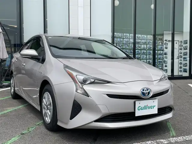 トヨタ プリウス S 長崎県 2017(平29)年 6.2万km スティールブロンドM 社外メモリナビ/バックカメラ/前後ドライブレコーダー/オートライト/LEDヘッドライト/横滑り防止/ステアリングスイッチ/ETC/スマートキー
