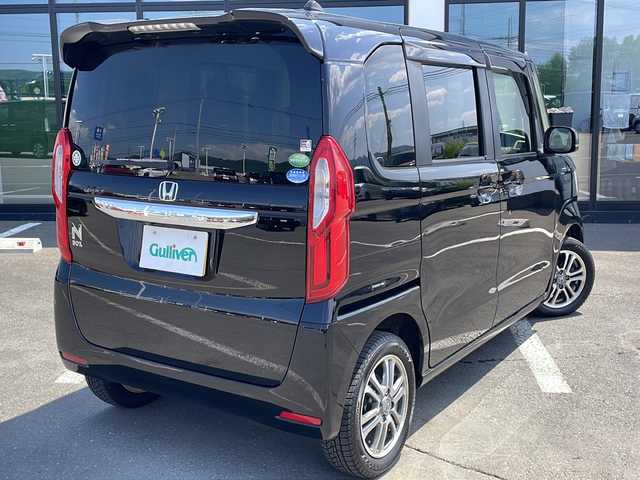ホンダ Ｎ ＢＯＸ L 道東・釧路十勝 2021(令3)年 11.4万km クリスタルブラックパール ・４WD/・社外ナビ/(FM・AM・CD・DVD・BT・USB)/・バックカメラ/・片側パワースライドドア/・衝突被害軽減ブレーキ/・レーダークルーズコントロール/・シートヒーター/・レーンアシスト/・リアパーキングセンサー/・オートマチックハイビーム/・オートライト/・LEDヘッドライト/・アイドリングストップ/・横滑り防止装置/・前席シートヒーター/・サイドミラーヒーター/・ドライブレコーダー/・ETC/・ステアリングスイッチ/・純正１４インチアルミホイール/・シートバックテーブル/・ロールサンシェード/・電格ウィンカーミラー/・ドアバイザー