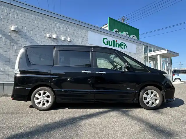 日産 セレナ ハイウェイS G Sハイブリッド 山形県 2012(平24)年 9.2万km スーパーブラック 純正ナビ/AM/FM/TV/DVD/CD/SD/Bluetooth/両側電動スライドドア/後席モニター/ウォークスルー/禁煙車/バックカメラ/LEDヘッドライト/クルーズコントロール/スマートキー/純正アルミ/純正オーディオ/アイドリングストップ/ETC/プッシュスタート/横滑り軽減/オートライト/フォグランプ/冬タイヤ積載/保証書/取扱説明書