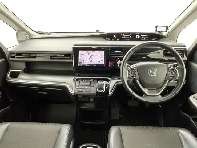 ホンダ ステップワゴン スパーダ ハイブリッド G EX ホンダセンシング 熊本県 2019(令1)年 6.7万km プラチナホワイトパール ワンオーナー　/禁煙車　/社外ナビ　/カロッツェリアフリップダウンモニター　/ビルトインＥＴＣ　/社外前後ドライブレコーダー　/バックカメラ/レーダークルーズコントロール/前後クリアランスソナー　/両側パワースライドドア　/前席シートヒーター　/ＧＰＳレーダー探知機/レーンキープアシスト/横滑り防止/デジタルインナーミラー/フロアマット/純正１６インチAW/オートライト/LEDヘッドライト/フォグライト/スマートキー/プッシュスタート/保証書/取扱説明書