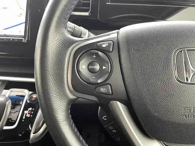 ホンダ ステップワゴン スパーダ ハイブリッド G EX ホンダセンシング 熊本県 2019(令1)年 6.7万km プラチナホワイトパール ワンオーナー　/禁煙車　/社外ナビ　/カロッツェリアフリップダウンモニター　/ビルトインＥＴＣ　/社外前後ドライブレコーダー　/バックカメラ/レーダークルーズコントロール/前後クリアランスソナー　/両側パワースライドドア　/前席シートヒーター　/ＧＰＳレーダー探知機/レーンキープアシスト/横滑り防止/デジタルインナーミラー/フロアマット/純正１６インチAW/オートライト/LEDヘッドライト/フォグライト/スマートキー/プッシュスタート/保証書/取扱説明書