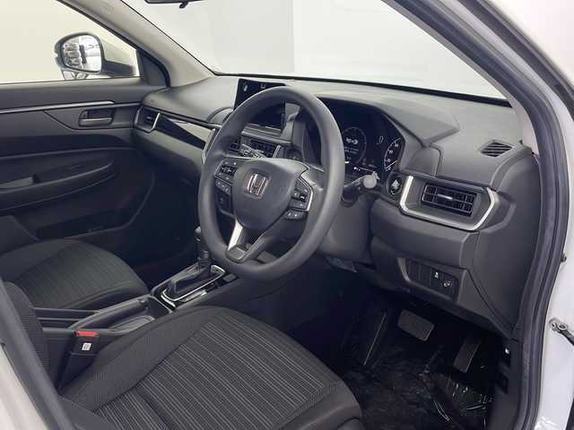ホンダ ＷＲ－Ｖ X 栃木県 2025(令7)年 0.1万km未満 プラチナホワイトパール 登録済み未使用車/ホンダセンシング/・プリクラッシュブレーキ/・車線逸脱防止/・踏み間違い衝突軽減/・パーキングセンサー警報/・横滑り防止/電動格納ミラー/ステアリングスイッチ/リアワイパー/プッシュスタート/スマートキー