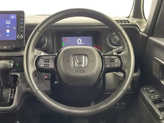 ホンダ Ｎ ＢＯＸ カスタム ターボ 栃木県 2023(令5)年 2.4万km メテオロイドグレーメタリック ターボ/純正ナビ/　（CD/DVD/フルセグTV/Bluetooth/MSV）/バックカメラ/フリップダウンモニター/ホンダセンシング/・衝突軽減ブレーキ/・誤発進抑制機能/・アダプティブクルーズコントロール/・車線維持支援システム/・路外逸脱抑制機能/・先行車発進お知らせ機能/・標識認識機能/・オートハイビーム/前後コーナーセンサー/ETC/両側パワースライドドア/ハーフレザーシート/純正AW/チップアップシート/LEDヘッドライト/サイド+カーテンエアバック