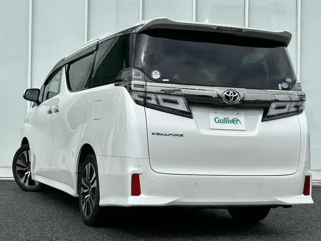 トヨタ ヴェルファイア Z Gエディション 福岡県 2018(平30)年 5.1万km ホワイトパールクリスタルシャイン MOP　JBLナビ/　（AM/FM/CD/DVD/ブルーレイ/BT/USB/AUX/SD/SD REC/フルセグ)/MOP　１３．３インチリアエンターテイメントシステム/　（HDMI付）/純正デジタルインナーミラー/BSM/RCTA/RSA/LTA/アラウンドビュー/ETC2.0/ヒートステアリング/置くだけ充電/シートヒーター（D席＋N席）/エアシート（D席＋N席）/パワーシート（１列目＋２列目）/D席メモリーシート/サンシェード/ISOFIX/純正バイザー/オート電格ミラー/DUALオートAAC/フォグランプ/LEDライト/純正マット