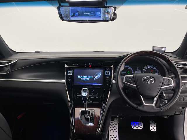 トヨタ ハリアー ハイブリッド プレミアム 長野県 2015(平27)年 3.8万km ホワイトパールクリスタルシャイン 4WD/サンルーフ/9インチ社外SDナビ（WVGA-EX900)/(ラジオ/フルセグTV/BT/DVD/SD/AUX)/バックカメラ/トヨタセーフティセンス/・クルーズコントロール/・レーンキープアシスト/・衝突被害軽減システム/盗難防止装置/電動リアゲート/社外デジタルインミラー/全方位ドライブレコーダー/ハーフレザーシート（合皮）/D席パワーシート/ステアリングスイッチ/純正ドアバイザー/18インチ純正アルミホイール/LEDヘッドライト/オートマチックハイビーム/フォグランプ/プッシュスタート/スマートキー/スペアキー/保証書/取扱説明書