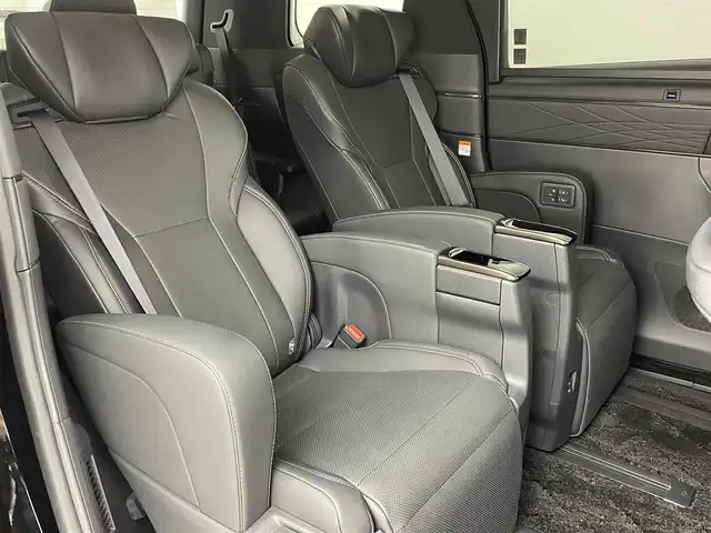 トヨタ アルファードハイブリット Z 福岡県 2024(令6)年 0.7万km ブラック 左右独立ムーンルーフ　/モデリスタエアロ／マフラー　/純正１４型ＤＡナビ／フルセグTV　/全方位カメラ　/ワイヤレス充電　/デジタルルームミラー　/ビルトインETC２．０　/ユニバーサルステップ　/トヨタセーフティセンス　/レーダークルーズコントロール　/コーナーセンサー　/衝突軽減ブレーキ　/レーンキープ　/ブラインドスポットモニター　/アクセル踏み間違い防止　/チームメイトアドバンストパーク　/両側電動スライドドア　/パワーバックドア　/シートベンチレーション／ヒーター　/ステアリングヒーター　/３眼ＬＥＤヘッドライト　/純正１８インチアルミホイール