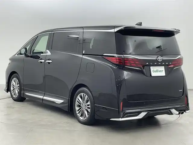 トヨタ アルファードハイブリット Z 福岡県 2024(令6)年 0.7万km ブラック 左右独立ムーンルーフ　/モデリスタエアロ／マフラー　/純正１４型ＤＡナビ／フルセグTV　/全方位カメラ　/ワイヤレス充電　/デジタルルームミラー　/ビルトインETC２．０　/ユニバーサルステップ　/トヨタセーフティセンス　/レーダークルーズコントロール　/コーナーセンサー　/衝突軽減ブレーキ　/レーンキープ　/ブラインドスポットモニター　/アクセル踏み間違い防止　/チームメイトアドバンストパーク　/両側電動スライドドア　/パワーバックドア　/シートベンチレーション／ヒーター　/ステアリングヒーター　/３眼ＬＥＤヘッドライト　/純正１８インチアルミホイール