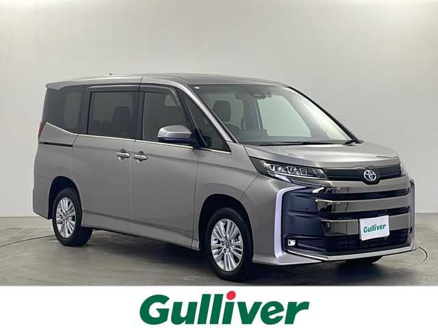 トヨタ ノア ハイブリッド S－Z 栃木県 2023(令5)年 2.9万km メタルストリームM 純正ナビ/（BT/フルセグ/ミラーリング/CD/DVD/AM/FM)/フリップダウンモニター/インテリジェントルームミラー　/ブラインドスポットモニター/衝突軽減システム　/レーダークルーズコントロール/パーキングサポートセンサー/車線逸脱抑制機能/両側パワースライドドア/電動リアゲート/ETC2.0/ドライブレコーダー/シートヒーター/ステアリングヒーター/純正アルミホイール/プッシュスタート/スマートキー