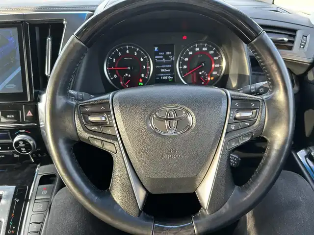 トヨタ ヴェルファイア Z Gエディション 岡山県 2019(平31)年 11.1万km ホワイトパールクリスタルシャイン 登録時走行距離110210km/ワンオーナー/純正8インチナビ/（SD/CD/DVD/Bluetooth）/純正フリップダウンモニター/トヨタセーフティーセンス/・プリクラッシュセーフティ/・レーントレーシングアシスト/・レーダークルーズコントロール/・レーンディパーチャーアラート/・オートマチックハイビーム/・ロードサインアシスト/モデリスタエアロ/ブラインドスポットモニター/パワーシート/エアーシート/シートヒーター/オートブレーキホールド/両側パワースライドドア/純正18インチホイール/ステアリングヒーター/ステアリングスイッチ/プッシュスタート/スマートキー