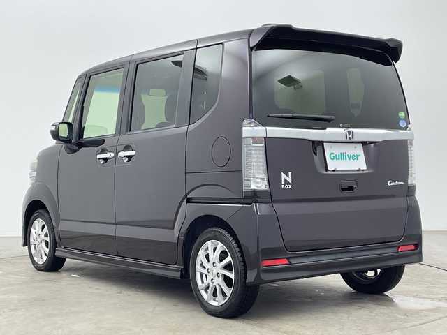 ホンダ Ｎ ＢＯＸ カスタム SSブラックSパッケージ 大分県 2016(平28)年 4.8万km プレミアムベルベットパープル・パール 純正ディーラーナビ/バックカメラ/TV/Bluetooth/CD/両側パワースライドドア/純正フロアマット/ナビ装着用スペシャルパッケージ/ETC/後席サンシェード/シートヒーター/ドライブレコーダー/社外14インチアルミホイール/キセノンヘッドライト/横滑り防止装置/オートライト/プッシュスタート/スマートキー/パワーウィンドウ/パワーステアリング/電動格納ミラー