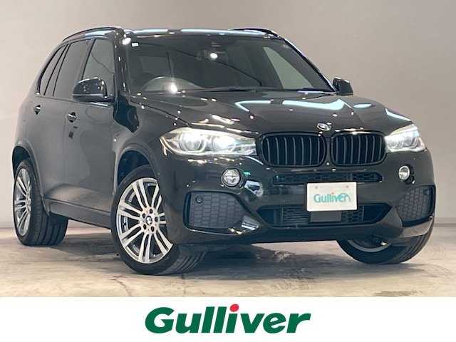 ＢＭＷ Ｘ５ xDrive 35d Mスポーツ 宮城県 2014(平26)年 9.4万km サファイアブラックP 4WD/ターボ/サンルーフ/ディーゼル/純正HDDナビ/バックカメラ/フルセグTV/CD/DVD/Bluetooth接続/衝突被害軽減システム/クルーズコントロール/レーンキープアシスト/コーナーセンサー前後/パドルシフト/ホールドブレーキ/電動リアゲート/3列シート/オットマン/レザーシート/シートメモリー/パワーシート/ルーフレール/LEDヘッドライト/オートライト/USB入力端子/純正ETC/純正アルミホイール/純正フロアマット