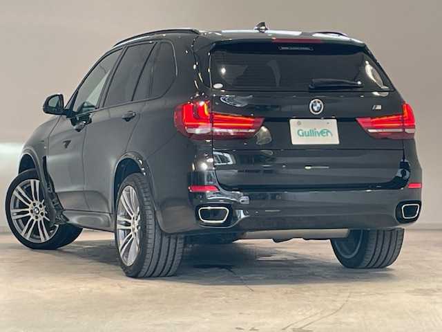 ＢＭＷ Ｘ５ xDrive 35d Mスポーツ 宮城県 2014(平26)年 9.4万km サファイアブラックP 4WD/ターボ/サンルーフ/ディーゼル/純正HDDナビ/バックカメラ/フルセグTV/CD/DVD/Bluetooth接続/衝突被害軽減システム/クルーズコントロール/レーンキープアシスト/コーナーセンサー前後/パドルシフト/ホールドブレーキ/電動リアゲート/3列シート/オットマン/レザーシート/シートメモリー/パワーシート/ルーフレール/LEDヘッドライト/オートライト/USB入力端子/純正ETC/純正アルミホイール/純正フロアマット