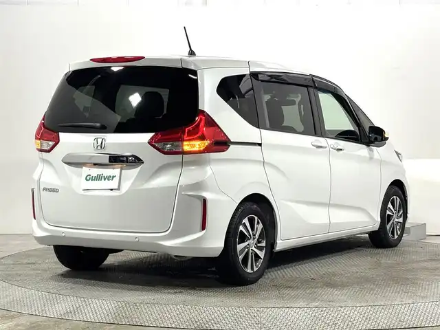 ホンダ フリード G 大阪府 2022(令4)年 0.9万km プラチナホワイトパール ホンダセンシング 社外ナビTV Bカメラ ETC ハーフレザー シートヒーター 両側パワースライドドア 衝突軽減 レーダーC レーンアシスト スマートキー Pスタート 前後ドラレコ ワンオーナー