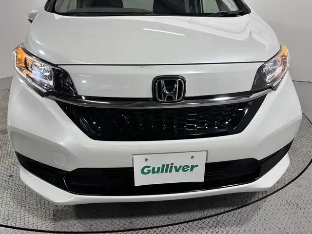 ホンダ フリード G 大阪府 2022(令4)年 0.9万km プラチナホワイトパール ホンダセンシング 社外ナビTV Bカメラ ETC ハーフレザー シートヒーター 両側パワースライドドア 衝突軽減 レーダーC レーンアシスト スマートキー Pスタート 前後ドラレコ ワンオーナー