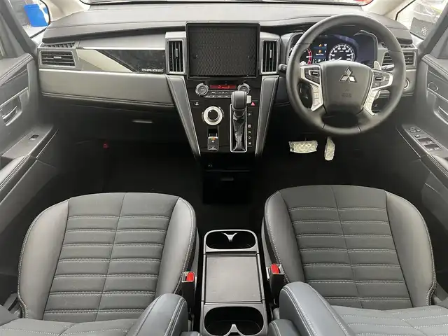 三菱 デリカＤ：５ シャモニー 滋賀県 2025(令7)年 0.1千km 黒 届出済み未使用車/全方位カメラ/両側パワースライドドア/ハーフレザーシート/追従クルーズコントロール/ブラインドスポットモニタリング/LEDヘッドライト/オートマチックハイビーム/D席パワーシート/D/Nシートヒーター/ステアリングヒーター/パワーバックドア/AC100V電源/電動パーキングブレーキ/オートブレーキホールド/パドルシフト/プッシュスタート/スマートキー/ステアリングリモコン