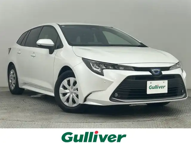 トヨタ カローラツーリング ハイブリッド G 道央・札幌 2024(令6)年 1.7万km プラチナホワイトパールマイカ ・４WD/・純正ディスプレイオーディオナビ/　BT/USB/フルセグ/・バックカメラ/・ビルトインETC/・トヨタセーフティセンス/・プリクラッシュセーフティ/・レーダークルーズコントロール/・クリアランスソナー/・オートハイビーム/・レーンディパーチャーアラート/・ブラインドスポットモニター/・プロアクティブドライビングアシスト/・リヤクロストラフィックアラート/・パーキングサポートブレーキ/・ロードサインアシスト/・LEDヘッドライト/・フォグライト/・オートライト/・フロアマット/・プッシュスタート/・スマートキー