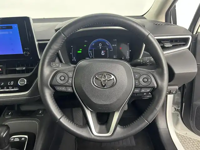 トヨタ カローラツーリング ハイブリッド G 道央・札幌 2024(令6)年 1.7万km プラチナホワイトパールマイカ ・４WD/・純正ディスプレイオーディオナビ/　BT/USB/フルセグ/・バックカメラ/・ビルトインETC/・トヨタセーフティセンス/・プリクラッシュセーフティ/・レーダークルーズコントロール/・クリアランスソナー/・オートハイビーム/・レーンディパーチャーアラート/・ブラインドスポットモニター/・プロアクティブドライビングアシスト/・リヤクロストラフィックアラート/・パーキングサポートブレーキ/・ロードサインアシスト/・LEDヘッドライト/・フォグライト/・オートライト/・フロアマット/・プッシュスタート/・スマートキー