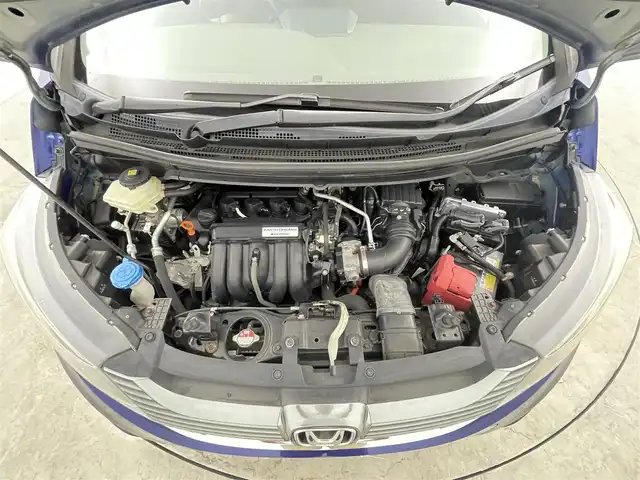 ホンダ フリード ハイブリット G ホンダセンシング 千葉県 2016(平28)年 6.7万km コバルトブルーパール 禁煙車/ホンダセンシング/衝突軽減ブレーキ〈CMBS〉/誤発進抑制機能/ACC〈アダプティブ・クルーズ・コントロール〉/LKAS〈車線維持支援システム〉/歩行者事故低減ステアリング/路外逸脱抑制機能/先行車発進お知らせ機能/標識認識機能/純正ナビ（VXM-175VFi）/CD/DVD/Bluetooth/フルセグ/バックカメラ/両側電動スライドドア/ビルトインETC/ステアリングリモコン/横滑り防止機能/リア席サンシェード/LEDヘッドライト/アクティブコーナリングライト/コンフォートビューパッケージ/Cパッケージ/純正フロアマット/スマートキー