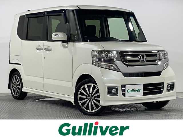 ホンダ Ｎ ＢＯＸ カスタム G ターボ Lパッケージ 広島県 2016(平28)年 4.2万km プレミアムホワイトパールⅡ 純正8型ナビ（DVD/Bluetooth/フルセグTV）/両側パワースライドドア/バックカメラ/衝突軽減ブレーキ/誤発進抑制機能/クルーズコントロール/HIDヘッドランプ/オートライト/パドルシフト/ステアリングスイッチ/ハーフレザーシート/純正15インチAW/ビルトインETC/ドライブレコーダー/スマートキー