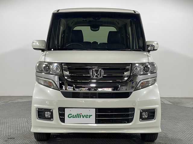 ホンダ Ｎ ＢＯＸ カスタム G ターボ Lパッケージ 広島県 2016(平28)年 4.2万km プレミアムホワイトパールⅡ 純正8型ナビ（DVD/Bluetooth/フルセグTV）/両側パワースライドドア/バックカメラ/衝突軽減ブレーキ/誤発進抑制機能/クルーズコントロール/HIDヘッドランプ/オートライト/パドルシフト/ステアリングスイッチ/ハーフレザーシート/純正15インチAW/ビルトインETC/ドライブレコーダー/スマートキー
