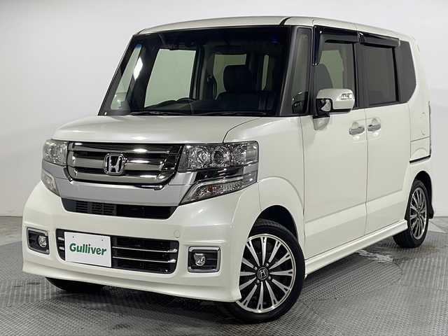 ホンダ Ｎ ＢＯＸ カスタム G ターボ Lパッケージ 広島県 2016(平28)年 4.2万km プレミアムホワイトパールⅡ 純正8型ナビ（DVD/Bluetooth/フルセグTV）/両側パワースライドドア/バックカメラ/衝突軽減ブレーキ/誤発進抑制機能/クルーズコントロール/HIDヘッドランプ/オートライト/パドルシフト/ステアリングスイッチ/ハーフレザーシート/純正15インチAW/ビルトインETC/ドライブレコーダー/スマートキー