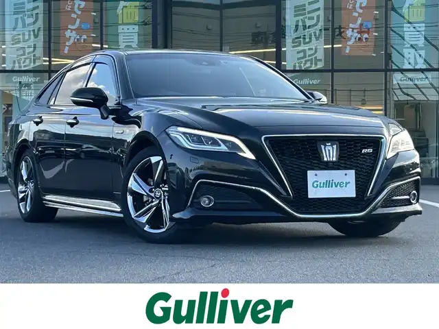 トヨタ クラウン ハイブリッド RS 岡山県 2018(平30)年 11.2万km プレシャスブラックパール 登録時走行距離111696km/純正ナビ/サンルーフ/フルセグTV(AM.FM.CD.DVD.TV.BT)/全方位カメラ/ETC2.0/ブラインドスポットモニター/ドライブレコーダー/シートヒーター/シートベンチレーション/ステアリングヒーター/クリアランスソナー/衝突軽減ブレーキ/横滑り防止装置/クルーズコントロール(追従走行あり)/車線逸脱警報（レーンキープアシスト）/オートライト/オートマチックハイビーム/アイドリングストップ/18インチ純正AW/純正フロアマット/レザーシート/D+N席パワーシート/保証書/取扱説明書