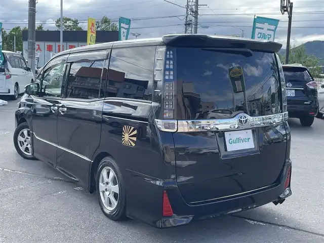 トヨタ ヴォクシー ZS 煌 長野県 2016(平28)年 9.6万km ブラック 4WD/ALPINEナビ/Bluetooth/フルセグテレビ（キャンセラー有）/ALPINEフリップダウンモニター/ビルトインETC/アイドリングストップ/三列シート/シートカバー/コーナーセンサー前後/社外マフラー/ローダウン/純正AW付サマータイヤ積み込み/エンジンスターター/保証書/取り扱い説明書