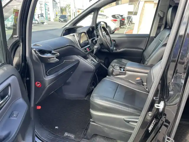 トヨタ ヴォクシー ZS 煌 長野県 2016(平28)年 9.6万km ブラック 4WD/ALPINEナビ/Bluetooth/フルセグテレビ（キャンセラー有）/ALPINEフリップダウンモニター/ビルトインETC/アイドリングストップ/三列シート/シートカバー/コーナーセンサー前後/社外マフラー/ローダウン/純正AW付サマータイヤ積み込み/エンジンスターター/保証書/取り扱い説明書