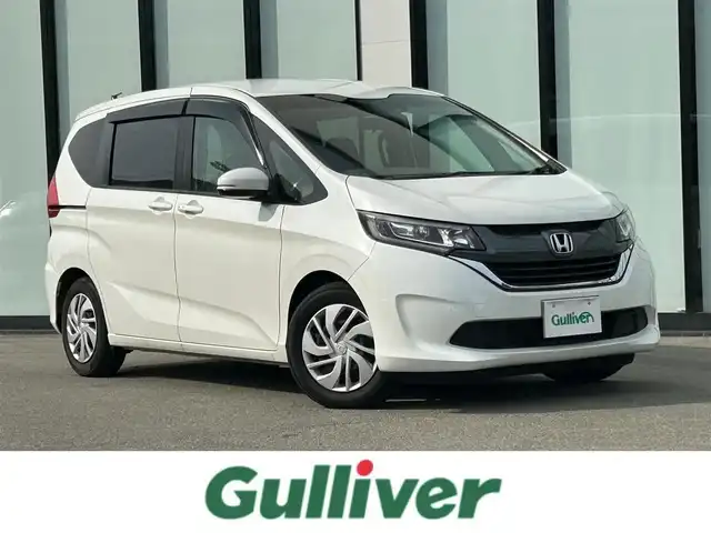 ホンダ フリード G ホンダセンシング 大阪府 2019(平31)年 3万km ホワイトオーキッドパール 純正9インチナビ/   フルセグTV/CD/DVD/Bluetooth/バックモニター/両側パワースライドドア/レーダークルーズコントロール/アイドリングストップ/ドライブレコーダー/純正フロアマット/プッシュスタート　/ＥＴＣ/ＬＥＤライト/禁煙車