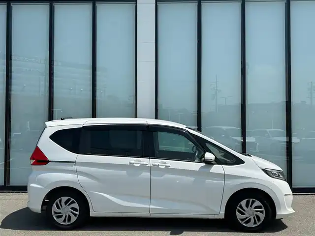 ホンダ フリード G ホンダセンシング 大阪府 2019(平31)年 3万km ホワイトオーキッドパール 純正9インチナビ/   フルセグTV/CD/DVD/Bluetooth/バックモニター/両側パワースライドドア/レーダークルーズコントロール/アイドリングストップ/ドライブレコーダー/純正フロアマット/プッシュスタート　/ＥＴＣ/ＬＥＤライト/禁煙車