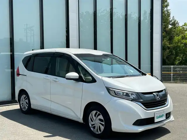 ホンダ フリード G ホンダセンシング 大阪府 2019(平31)年 3万km ホワイトオーキッドパール 純正9インチナビ/   フルセグTV/CD/DVD/Bluetooth/バックモニター/両側パワースライドドア/レーダークルーズコントロール/アイドリングストップ/ドライブレコーダー/純正フロアマット/プッシュスタート　/ＥＴＣ/ＬＥＤライト/禁煙車
