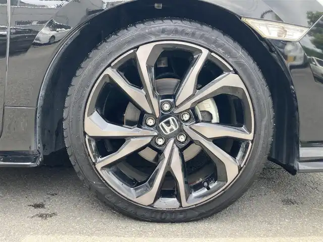 ホンダ シビック ハッチバック 静岡県 2019(令1)年 6.8万km クリスタルブラックパール HondaSENSING/純正7インチメモリーナビ(VXM-194VFi)/　AM FM CD DVD Bluetooth USB/ビルトインETC/バックモニター/レーダークルーズコントロール/LEDオートヘッドランプ/オートブレーキホールド/純正18インチアルミホイール/スマートキー2本/パドルシフト/社外レーダー探知機/フルセグTV/シートヒーター(前席)/前方ドライブレコーダー