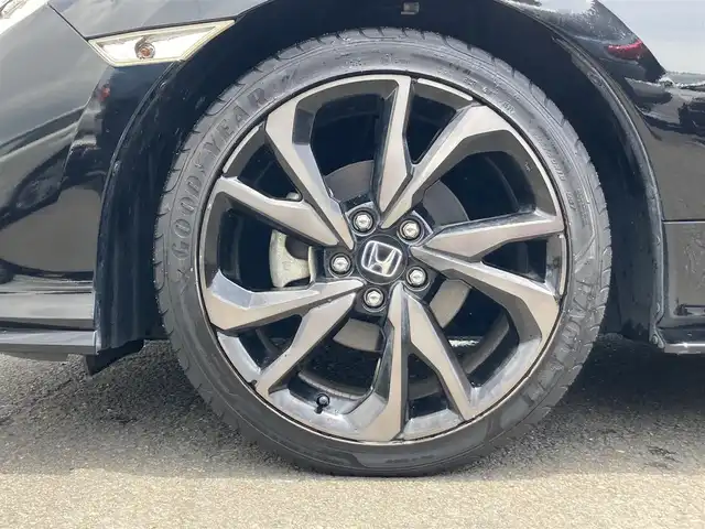ホンダ シビック ハッチバック 静岡県 2019(令1)年 6.8万km クリスタルブラックパール HondaSENSING/純正7インチメモリーナビ(VXM-194VFi)/　AM FM CD DVD Bluetooth USB/ビルトインETC/バックモニター/レーダークルーズコントロール/LEDオートヘッドランプ/オートブレーキホールド/純正18インチアルミホイール/スマートキー2本/パドルシフト/社外レーダー探知機/フルセグTV/シートヒーター(前席)/前方ドライブレコーダー