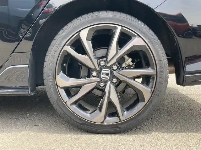 ホンダ シビック ハッチバック 静岡県 2019(令1)年 6.8万km クリスタルブラックパール HondaSENSING/純正7インチメモリーナビ(VXM-194VFi)/　AM FM CD DVD Bluetooth USB/ビルトインETC/バックモニター/レーダークルーズコントロール/LEDオートヘッドランプ/オートブレーキホールド/純正18インチアルミホイール/スマートキー2本/パドルシフト/社外レーダー探知機/フルセグTV/シートヒーター(前席)/前方ドライブレコーダー
