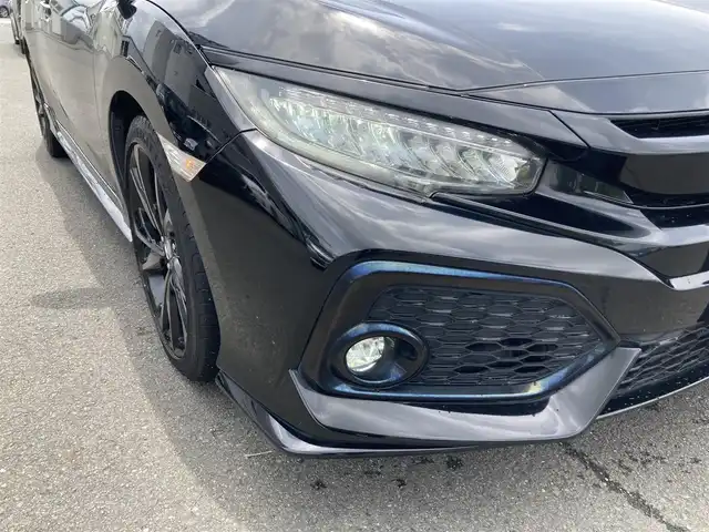 ホンダ シビック ハッチバック 静岡県 2019(令1)年 6.8万km クリスタルブラックパール HondaSENSING/純正7インチメモリーナビ(VXM-194VFi)/　AM FM CD DVD Bluetooth USB/ビルトインETC/バックモニター/レーダークルーズコントロール/LEDオートヘッドランプ/オートブレーキホールド/純正18インチアルミホイール/スマートキー2本/パドルシフト/社外レーダー探知機/フルセグTV/シートヒーター(前席)/前方ドライブレコーダー