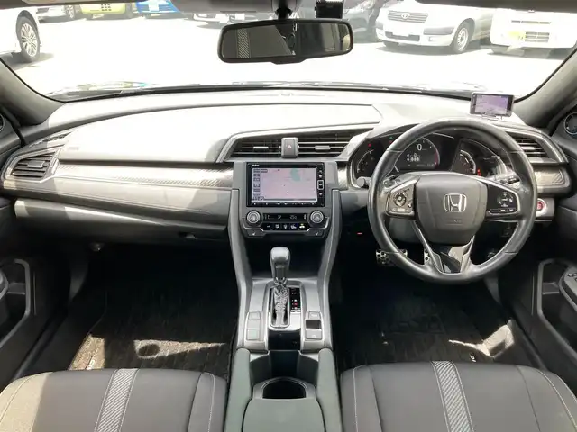 ホンダ シビック ハッチバック 静岡県 2019(令1)年 6.8万km クリスタルブラックパール HondaSENSING/純正7インチメモリーナビ(VXM-194VFi)/　AM FM CD DVD Bluetooth USB/ビルトインETC/バックモニター/レーダークルーズコントロール/LEDオートヘッドランプ/オートブレーキホールド/純正18インチアルミホイール/スマートキー2本/パドルシフト/社外レーダー探知機/フルセグTV/シートヒーター(前席)/前方ドライブレコーダー