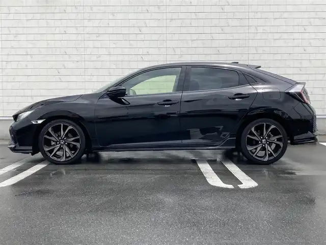 ホンダ シビック ハッチバック 静岡県 2019(令1)年 6.8万km クリスタルブラックパール HondaSENSING/純正7インチメモリーナビ(VXM-194VFi)/　AM FM CD DVD Bluetooth USB/ビルトインETC/バックモニター/レーダークルーズコントロール/LEDオートヘッドランプ/オートブレーキホールド/純正18インチアルミホイール/スマートキー2本/パドルシフト/社外レーダー探知機/フルセグTV/シートヒーター(前席)/前方ドライブレコーダー