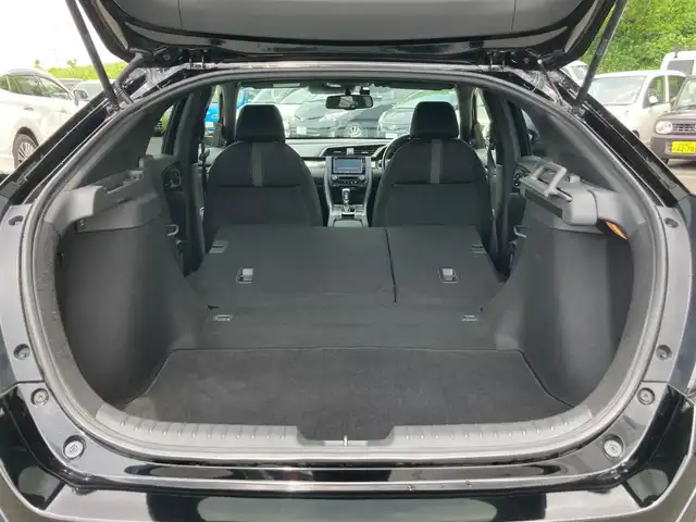 ホンダ シビック ハッチバック 静岡県 2019(令1)年 6.8万km クリスタルブラックパール HondaSENSING/純正7インチメモリーナビ(VXM-194VFi)/　AM FM CD DVD Bluetooth USB/ビルトインETC/バックモニター/レーダークルーズコントロール/LEDオートヘッドランプ/オートブレーキホールド/純正18インチアルミホイール/スマートキー2本/パドルシフト/社外レーダー探知機/フルセグTV/シートヒーター(前席)/前方ドライブレコーダー