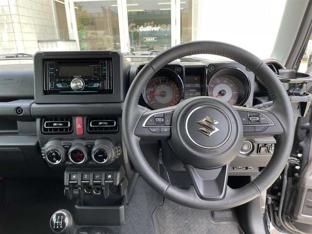 スズキ ジムニー XC 石川県 2023(令5)年 2.8万km ブルーイッシュブラックパール3 4WD/社外オーディオ/ブラックアルミホイール/クルーズコントロール/スマートキー/プッシュスタート/電動ミラー/LEDヘッドライト/シートヒーター/ロッドホルダー/オプショングリル/フォグランプ/ETC/保証書