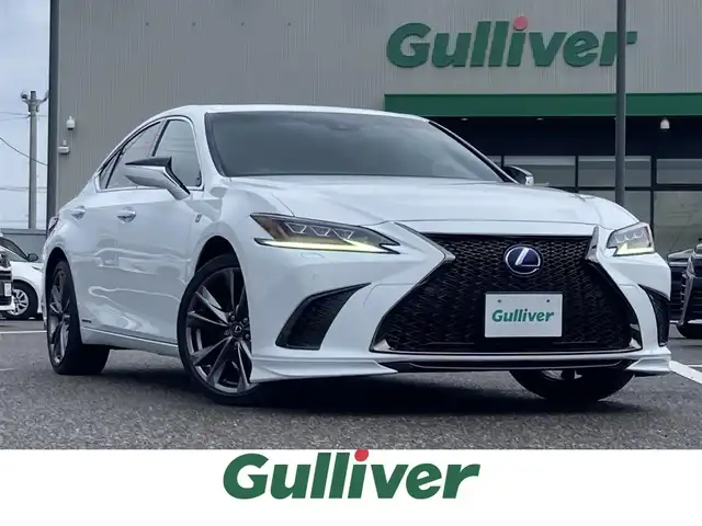 レクサス ＥＳ 300h Fスポーツ 島根県 2019(平31)年 6万km ホワイトノーヴァガラスフレーク 純正12.3型ナビ(CD/DVD/BT/フルセグ)/サンルーフ/バックカメラ/ビルトインETC2.0/プリクラッシュセーフティ/レーンキーピングアシスト/アダプティブハイビームシステム/標識認識機能/先行車発進お知らせ機能/ブラインドスポットモニター/レーダークルーズコントロール/前席パワーシート/前席シートヒーター /前席シートベンチレーション/運転席シートメモリー/ステアリングヒーター/360°ドラレコ/カラーヘッドアップディスプレイ/LEDヘッドランプ/革巻きステアリング/パドルシフト/リヤ電動サンシェード/純正フロアマット/TRDフロントスポイラー/純正19インチアルミホイール